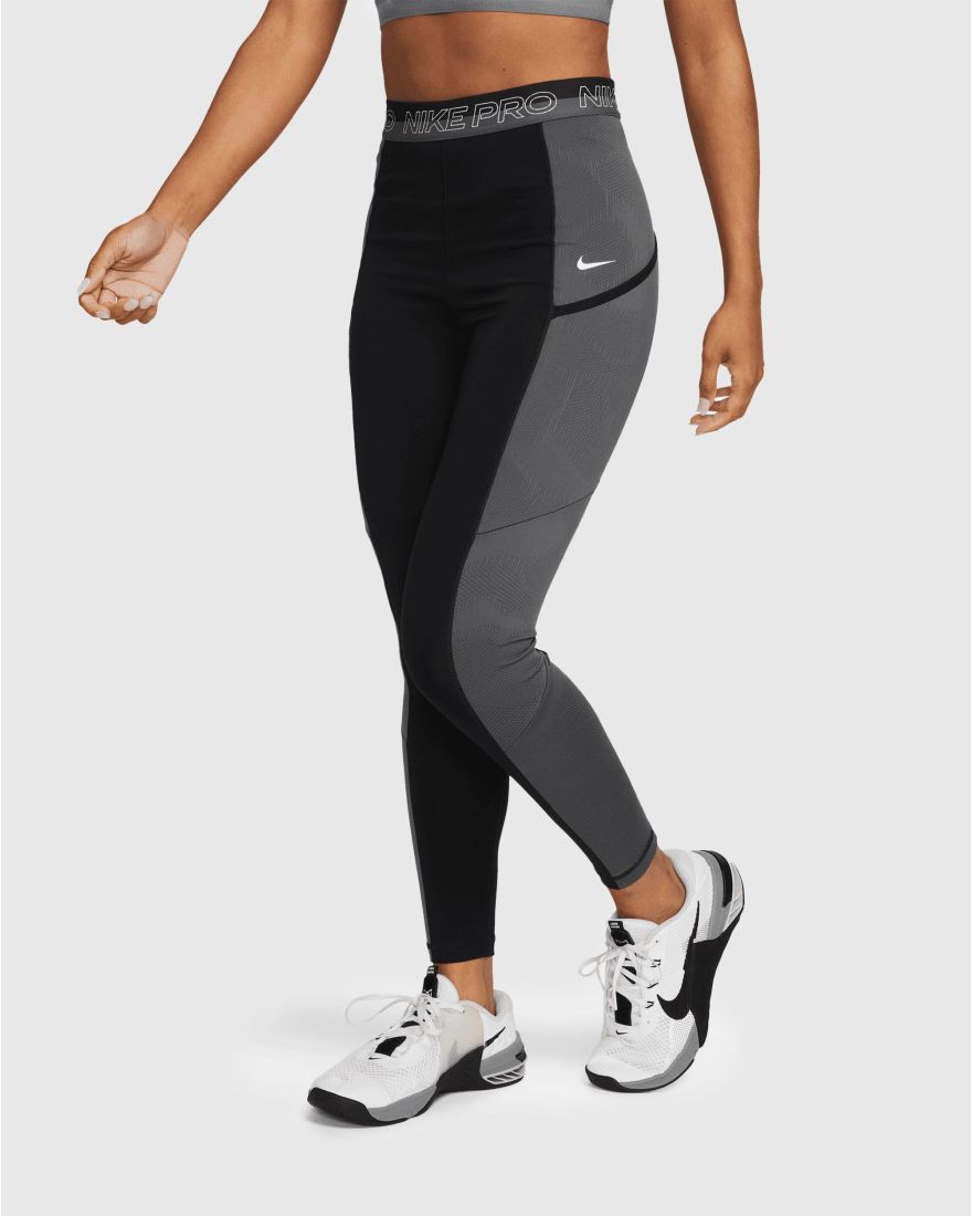 Nike Leggings Dri-FIT da training a 7/8 a vita alta con tasche