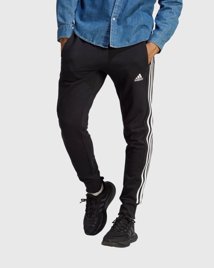 Adidas Pantaloni Essentials French Terry Tapered Cuff 3-Stripes Nero Uomo