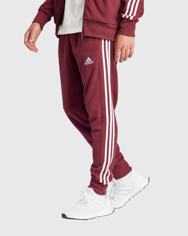 Adidas Pantaloni Essentials French Terry Tapered Cuff 3-Stripes Rosso Uomo