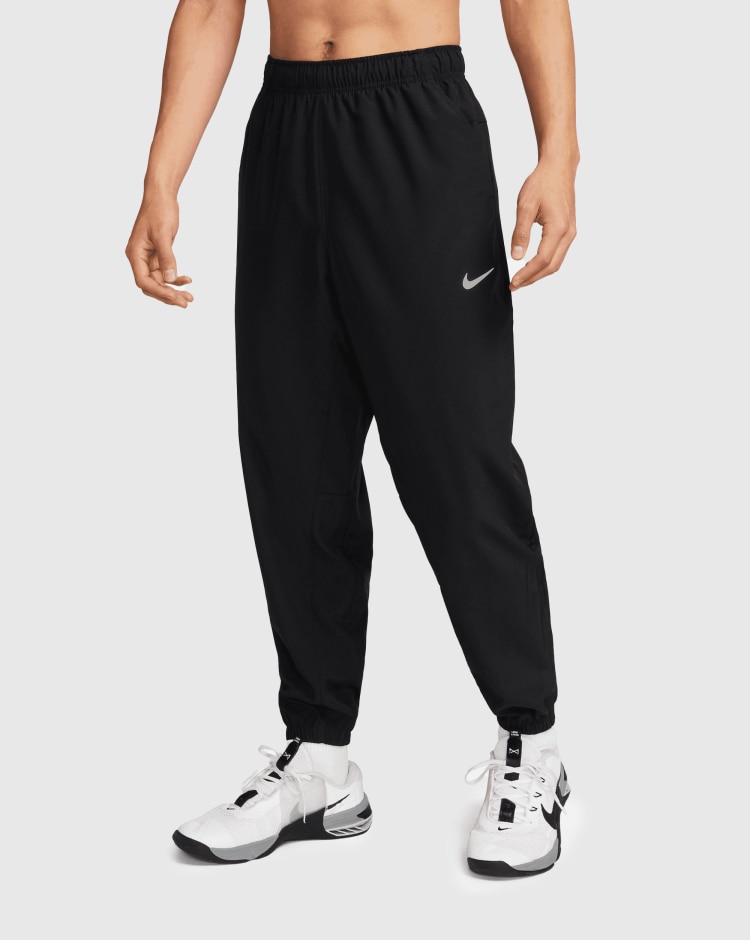 Pantaloni versatili affusolati Dri-FIT Nero Uomo