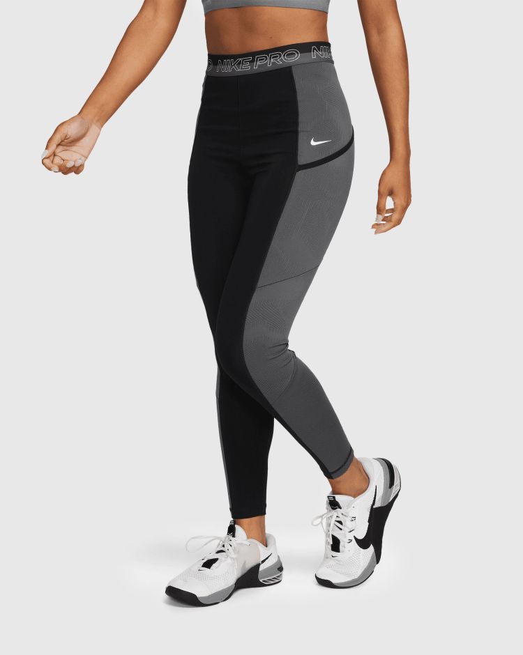 Nike Leggings Dri-FIT da training a 7/8 a vita alta con tasche Nero Donna